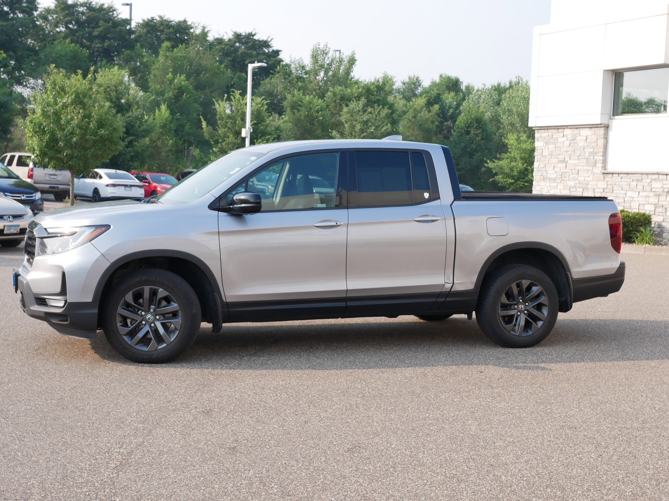 Used 2021 Honda Ridgeline Sport with VIN 5FPYK3F12MB023647 for sale in Coon Rapids, Minnesota