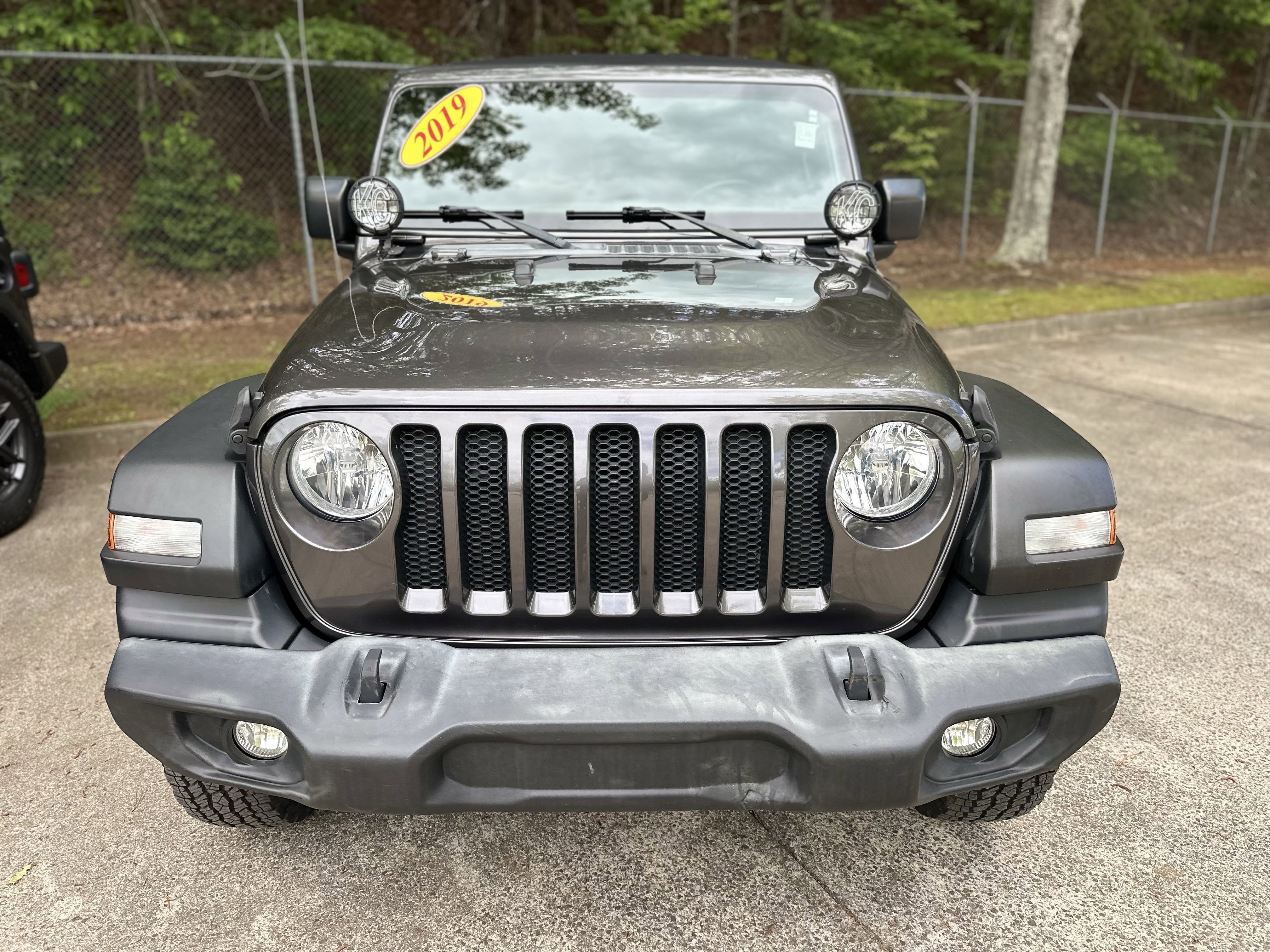 Used 2019 Jeep Wrangler Unlimited Sport S with VIN 1C4HJXDN6KW670165 for sale in Jasper, GA