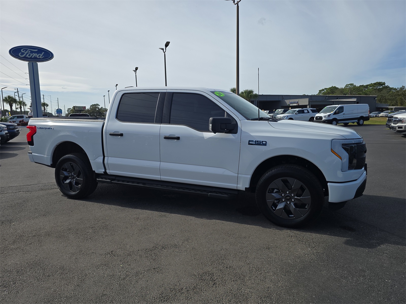 Certified 2024 Ford F-150 Lightning XLT with VIN 1FTVW3LK9RWG14123 for sale in Spring Hill, FL
