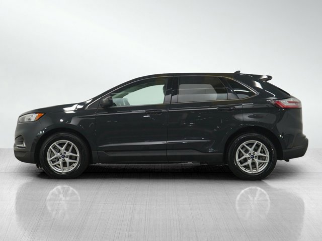 Used 2021 Ford Edge SEL with VIN 2FMPK4J98MBA13687 for sale in Burnsville, Minnesota