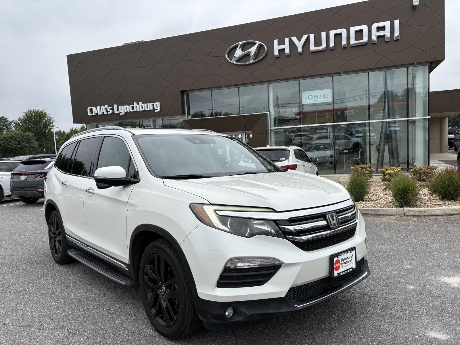 Used 2016 Honda Pilot Touring with VIN 5FNYF6H91GB013259 for sale in Lynchburg, VA