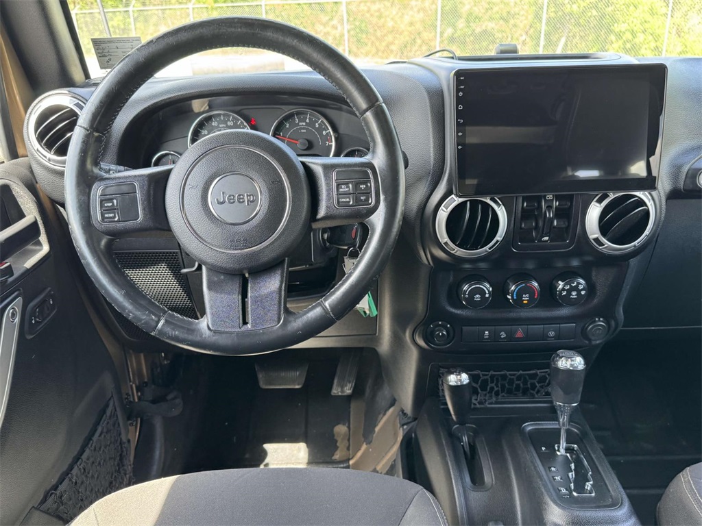 2015 Jeep Wrangler Unlimited Sahara photo 2