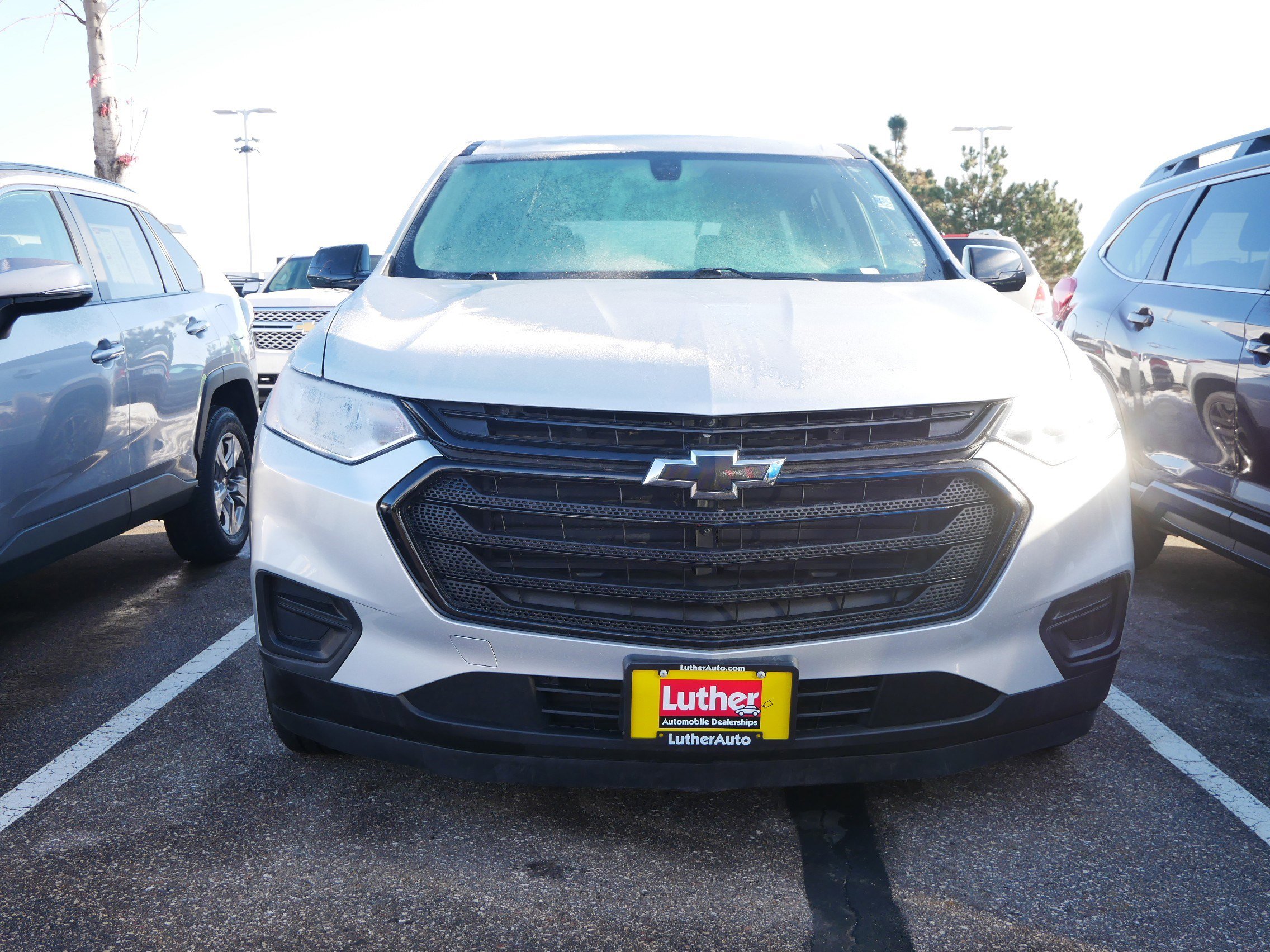 Used 2019 Chevrolet Traverse LS with VIN 1GNEVFKWXKJ319132 for sale in Brooklyn Center, Minnesota