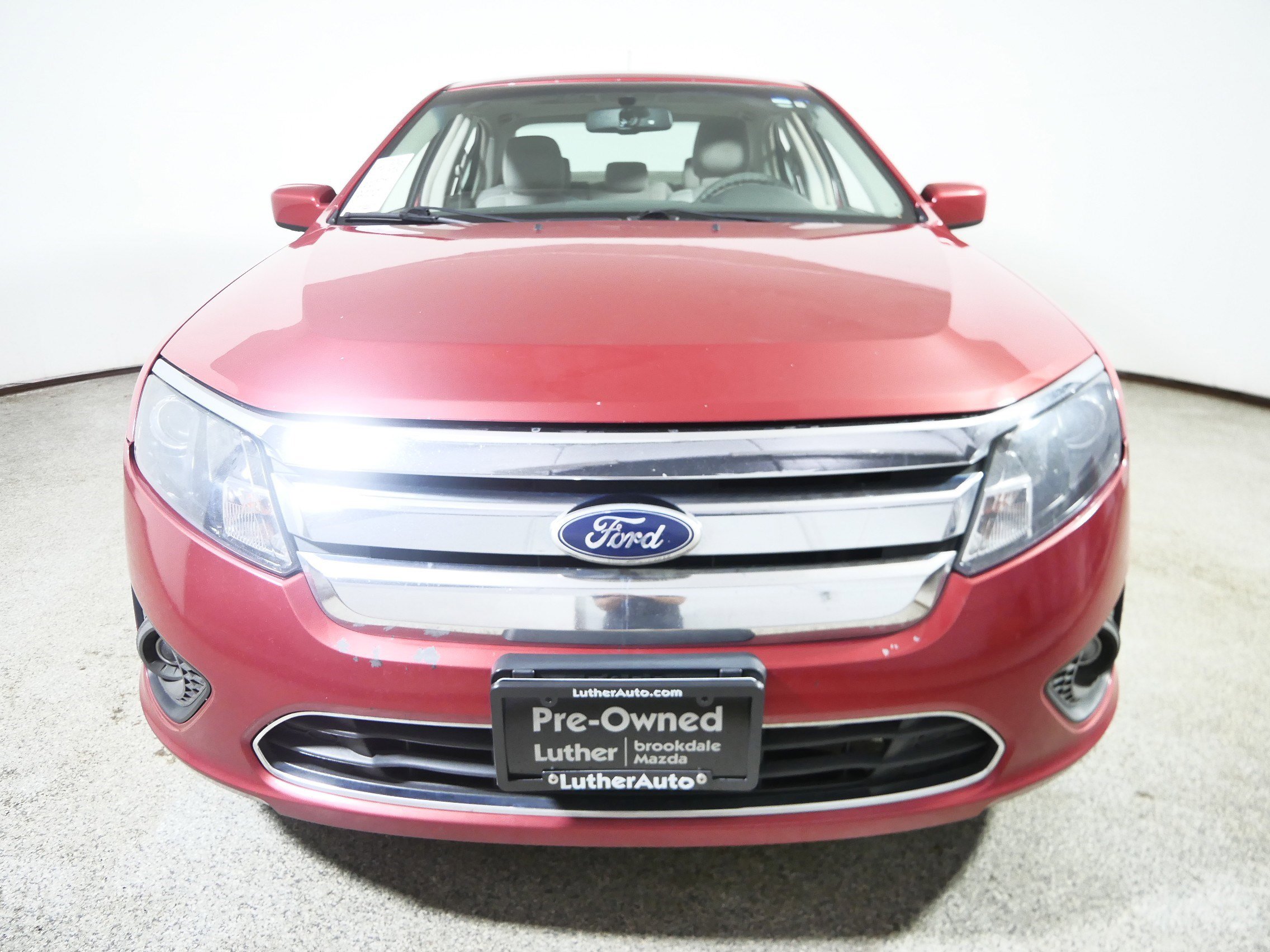 Used 2010 Ford Fusion SE with VIN 3FAHP0HA0AR402863 for sale in Brooklyn Center, Minnesota