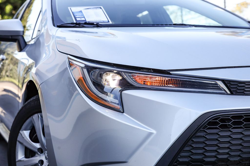 Used 2021 Toyota Corolla LE with VIN 5YFEPMAE1MP188235 for sale in Kansas City