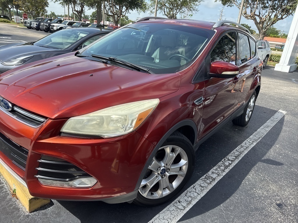 Used 2016 Ford Escape Titanium with VIN 1FMCU0JX9GUA18122 for sale in Stuart, FL