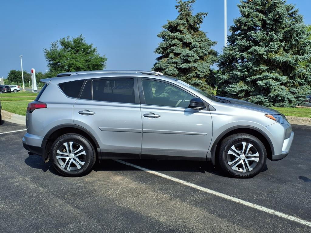 Certified 2018 Toyota RAV4 LE with VIN JTMBFREV3JJ256547 for sale in Burnsville, Minnesota