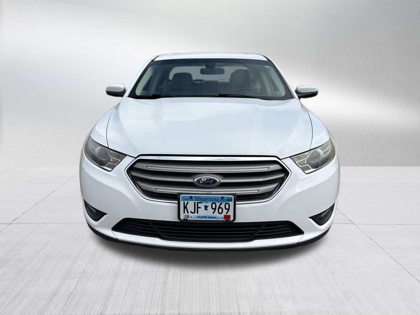 Used 2015 Ford Taurus SEL with VIN 1FAHP2E87FG119114 for sale in Coon Rapids, Minnesota