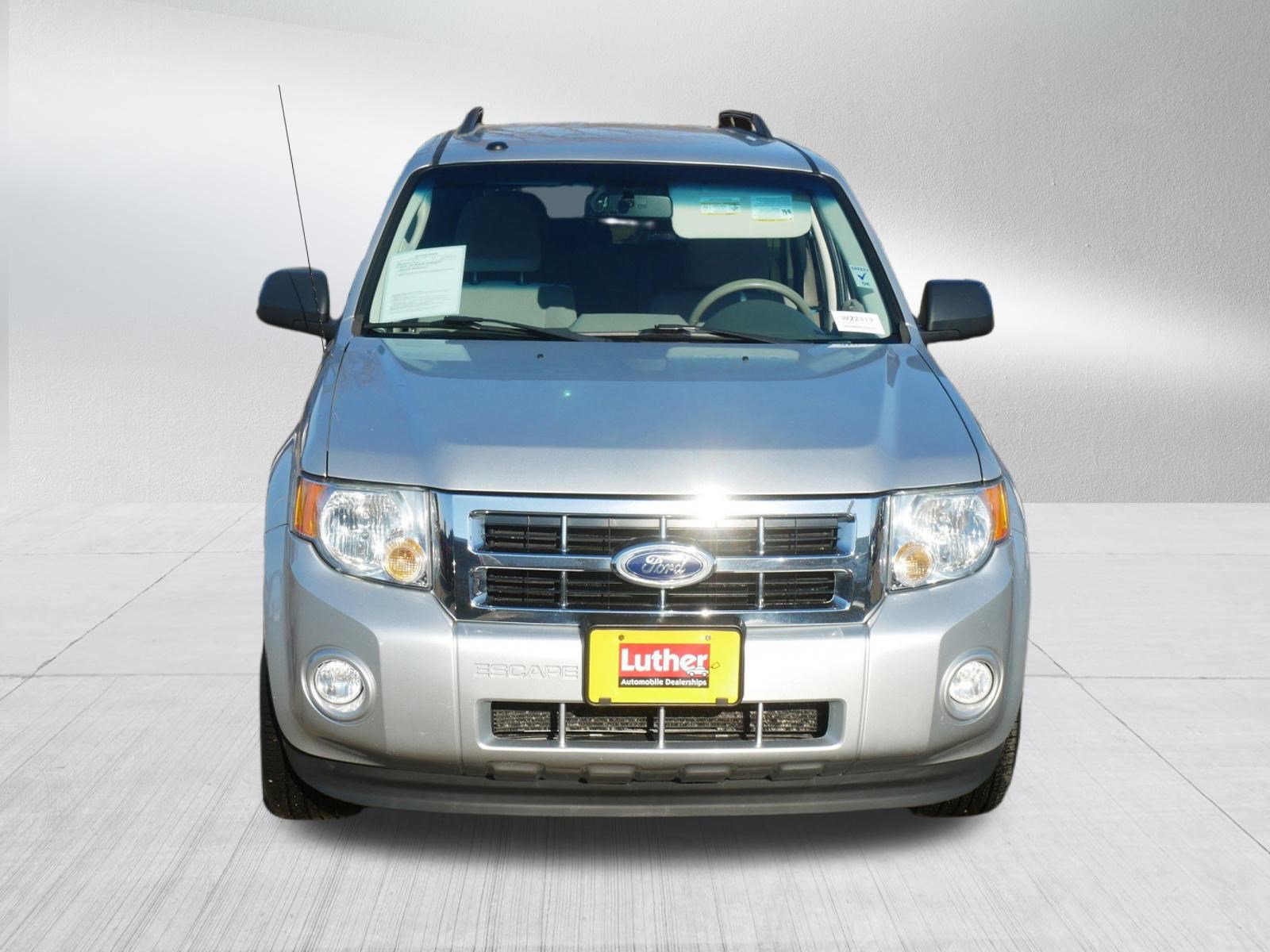 Used 2010 Ford Escape XLT with VIN 1FMCU9D79AKC13253 for sale in Coon Rapids, Minnesota