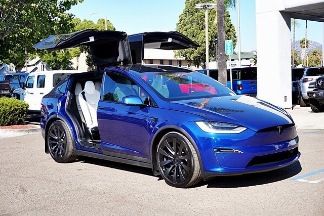 Used 2022 Blue Tesla Plaid image 1
