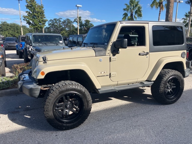 Used 2017 Jeep Wrangler Sahara with VIN 1C4AJWBG0HL653212 for sale in Lutz, FL
