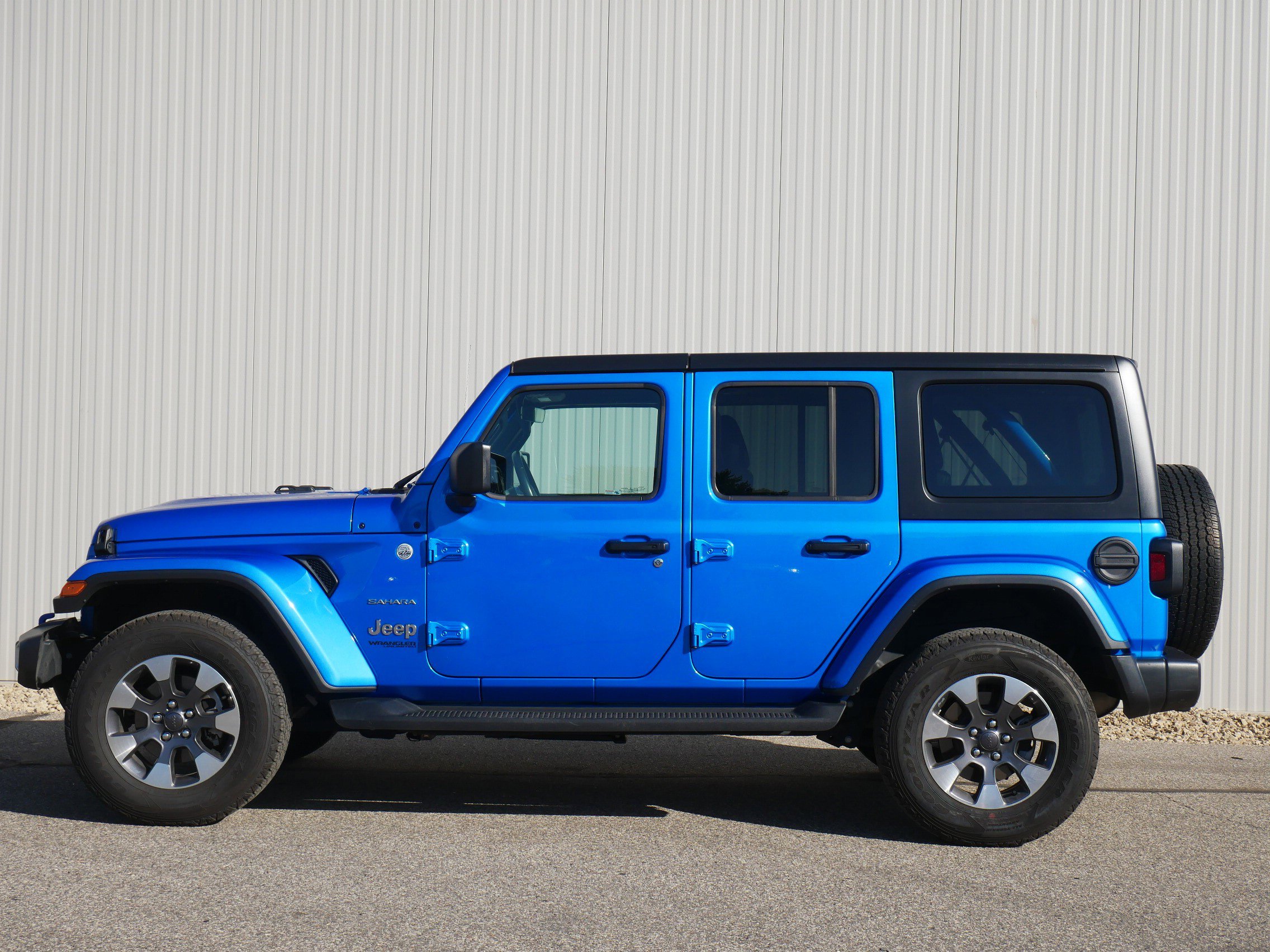Used 2022 Jeep Wrangler Unlimited Sahara with VIN 1C4HJXEG9NW102755 for sale in Hastings, Minnesota