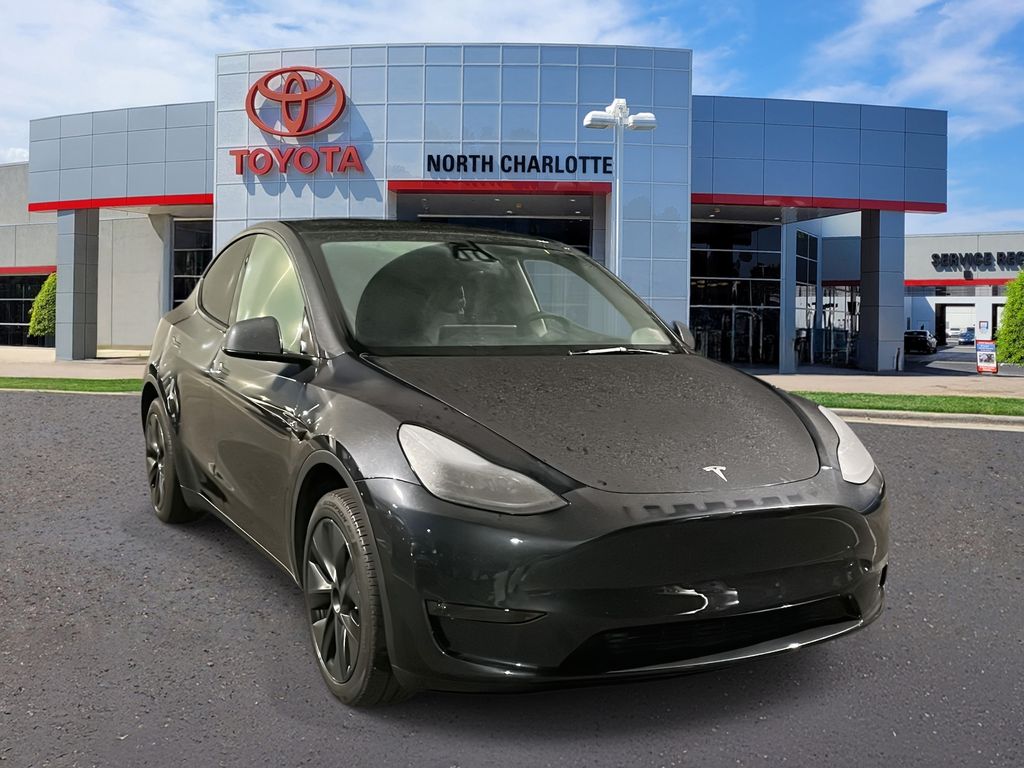 Used 2024 Tesla Model Y Long Range with VIN 7SAYGDED2RA331887 for sale in Huntersville, NC