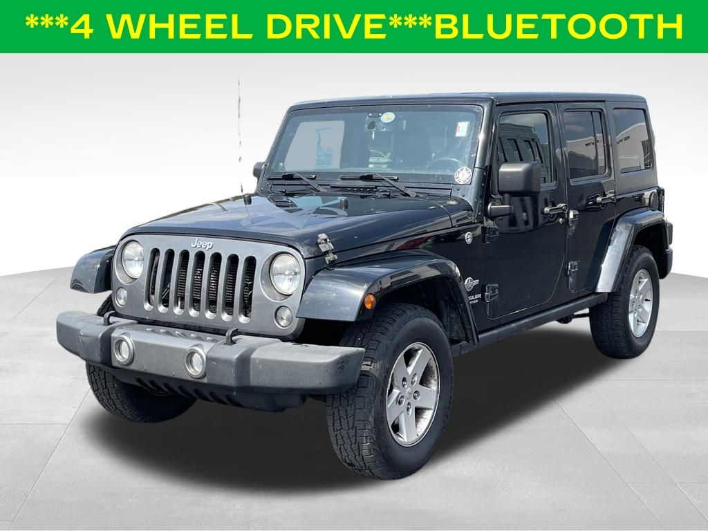 Used 2014 Jeep Wrangler Unlimited Freedom Edition with VIN 1C4BJWDG5EL241400 for sale in Norton, OH