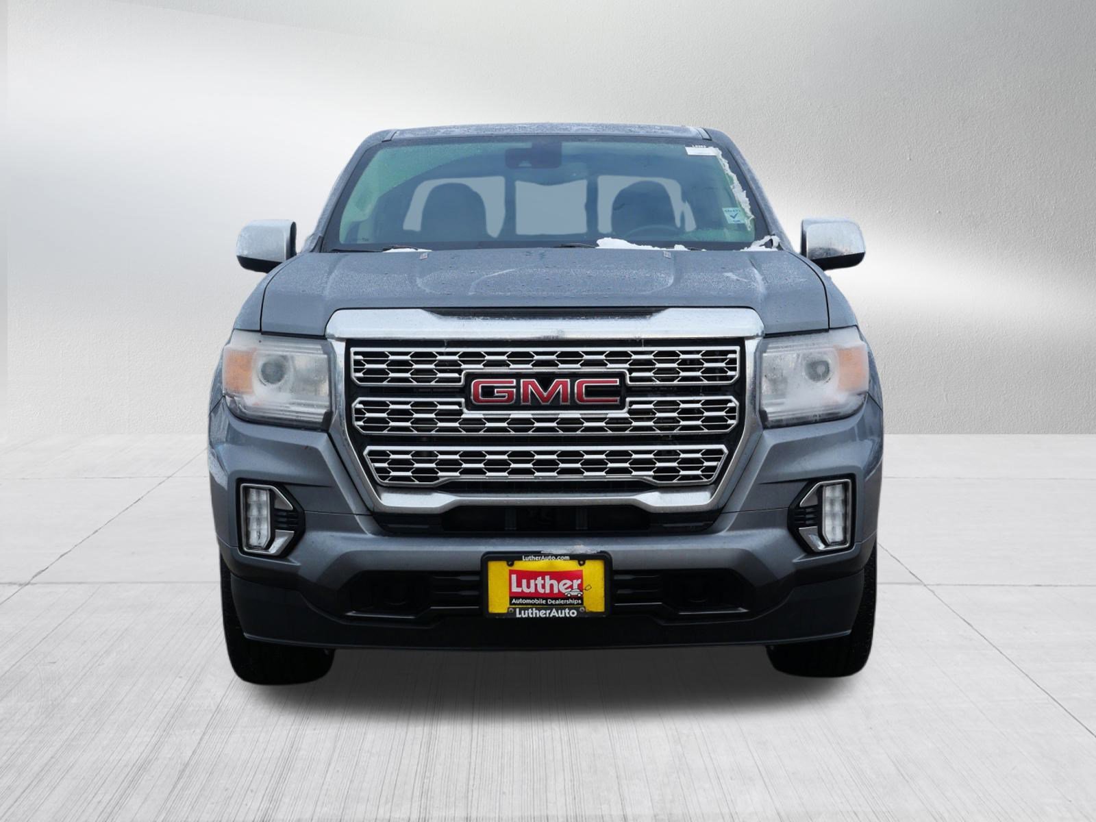 Used 2021 GMC Canyon Denali with VIN 1GTP6EE18M1174071 for sale in Waite Park, Minnesota