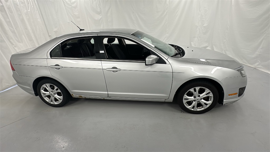 Used 2012 Ford Fusion SE with VIN 3FAHP0HA0CR124159 for sale in Janesville, WI
