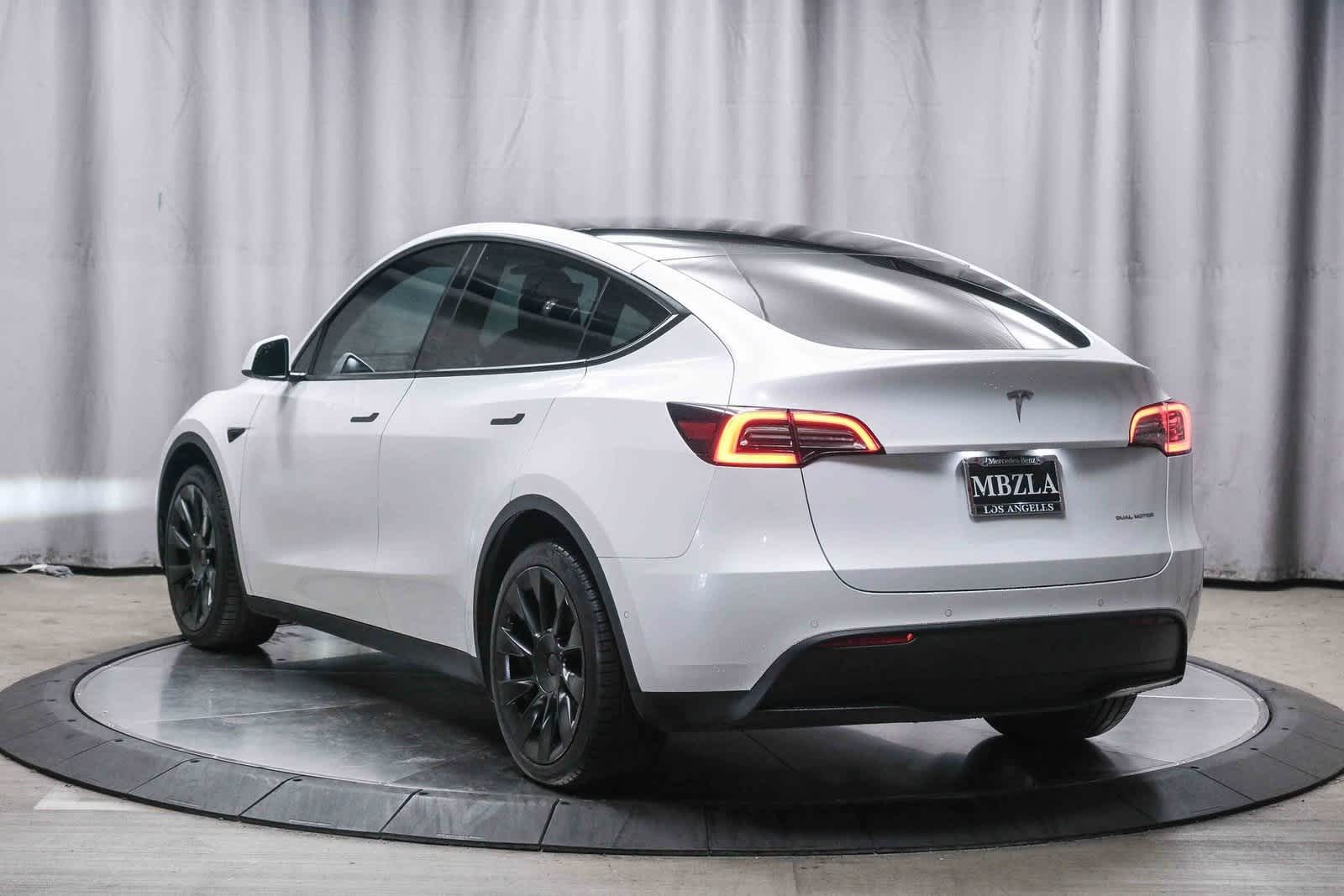 Used 2021 Tesla Model Y Long Range with VIN 5YJYGDEE9MF300718 for sale in Kansas City