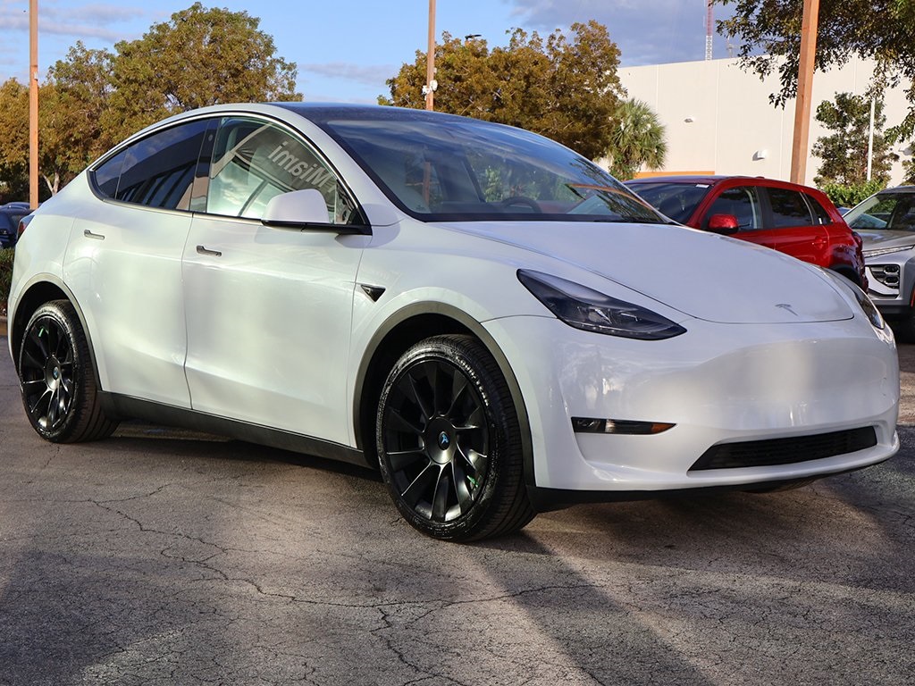 Used 2023 Tesla Model Y Long Range with VIN 7SAYGDEE1PF637861 for sale in Kansas City