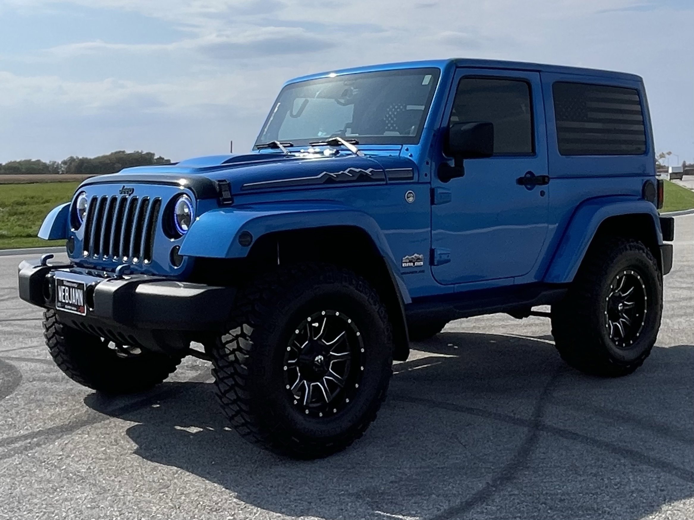 Used 2014 Jeep Wrangler Sahara with VIN 1C4AJWBG4EL205695 for sale in Saint Charles, Minnesota