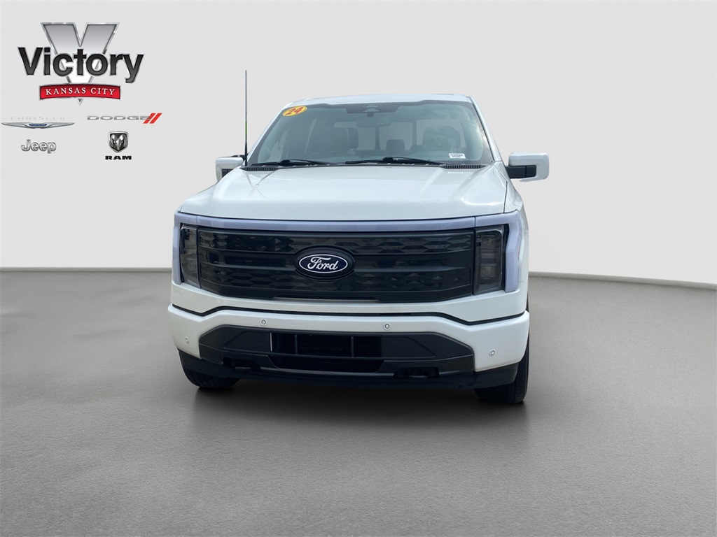 Used 2024 Ford F-150 Lightning Platinum with VIN 1FT6W7L75RWG16670 for sale in Kansas City, KS