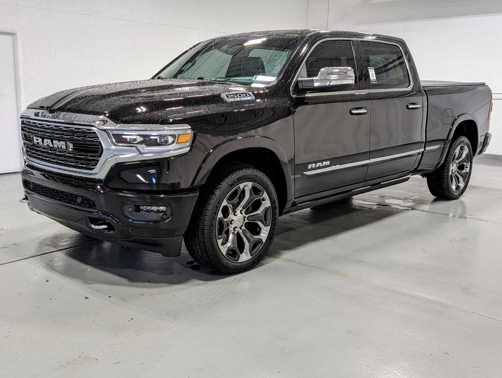 PreOwned 2021 Ram 1500 Limited 4×4 Crew Cab 64 Box in Diamond Black