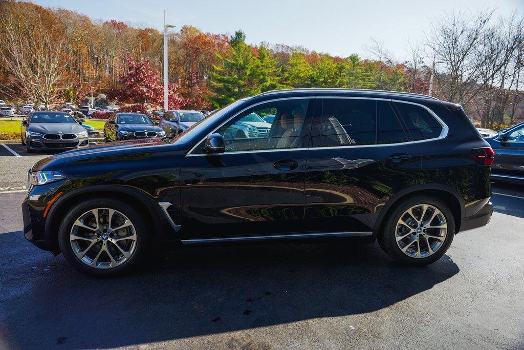 New 2025 Black Sapphire Metallic BMW xDrive50e image 5