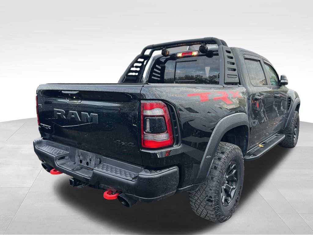Used 2022 RAM Ram 1500 TRX with VIN 1C6SRFU9XNN387653 for sale in Coon Rapids, Minnesota
