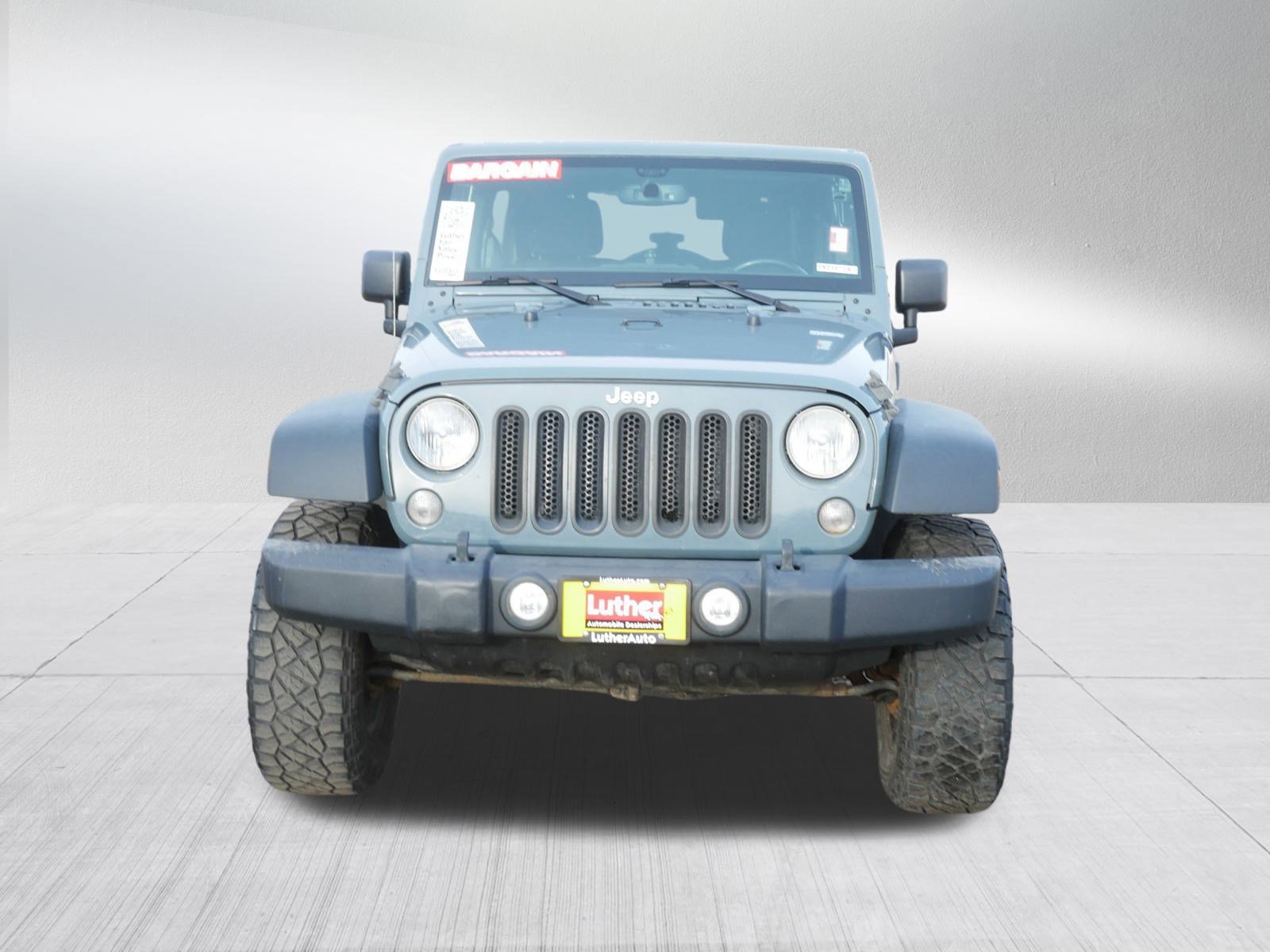 Used 2014 Jeep Wrangler Unlimited Sport with VIN 1C4BJWDG6EL250218 for sale in Cambridge, MN