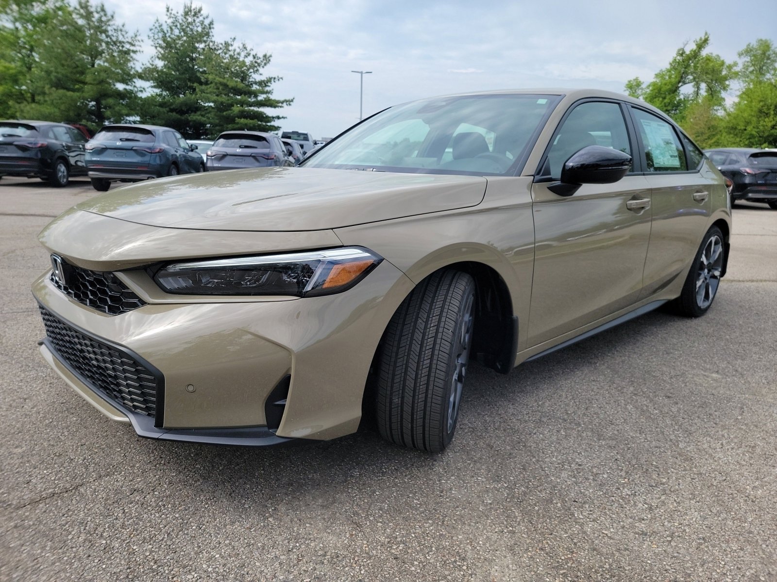 2026 Honda Civic Sport Touring Hatchback Hybrid photo 3