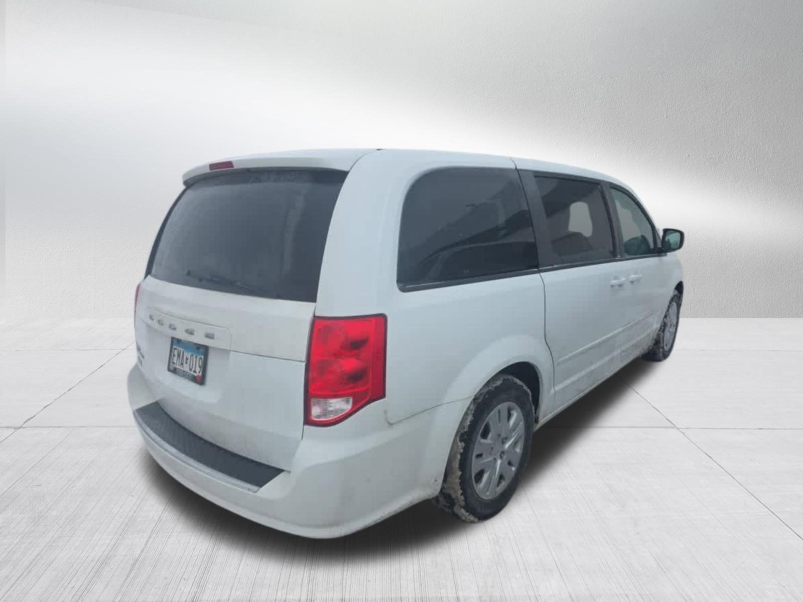 Used 2014 Dodge Grand Caravan SE with VIN 2C4RDGBG0ER130887 for sale in Brooklyn Center, Minnesota