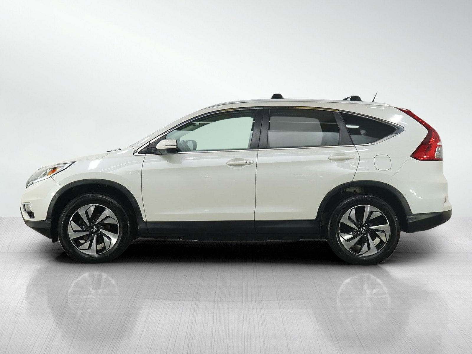 Used 2016 Honda CR-V Touring with VIN 5J6RM4H90GL099542 for sale in Burnsville, Minnesota