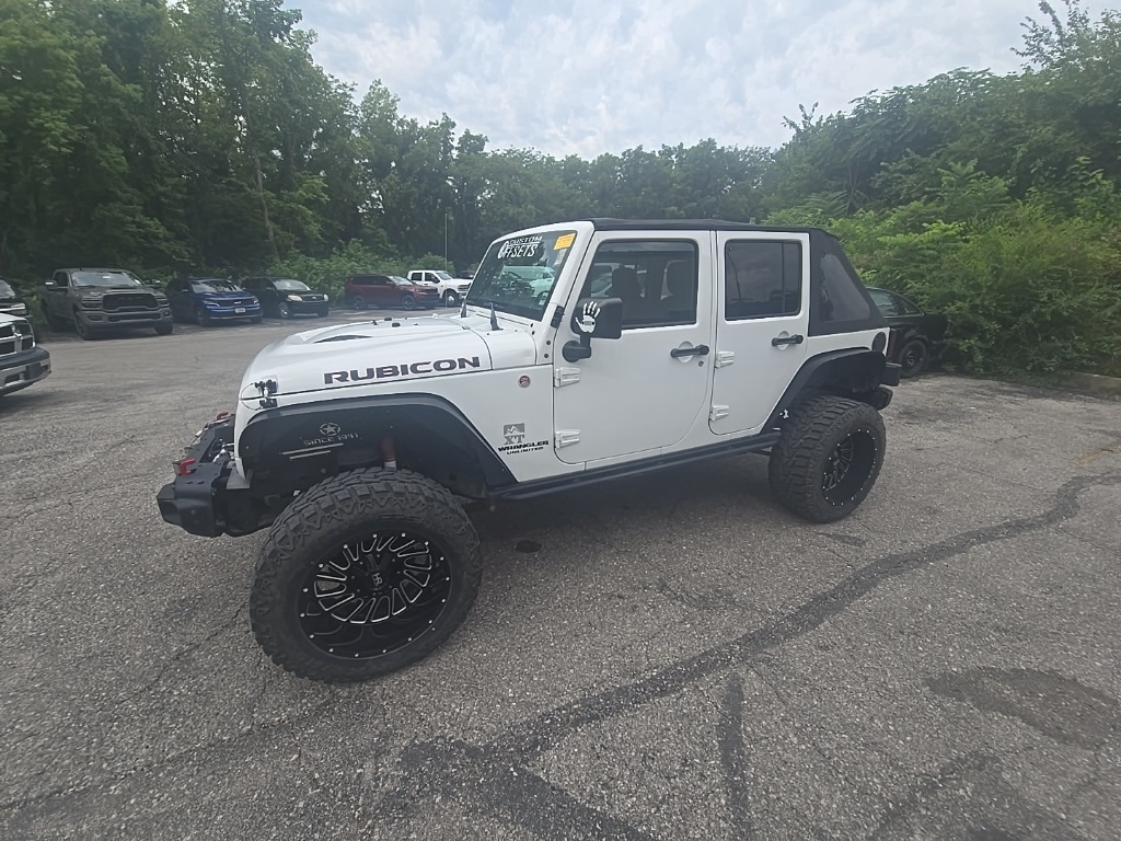 Used 2015 Jeep Wrangler Unlimited Rubicon with VIN 1C4HJWFGXFL511455 for sale in Kansas City