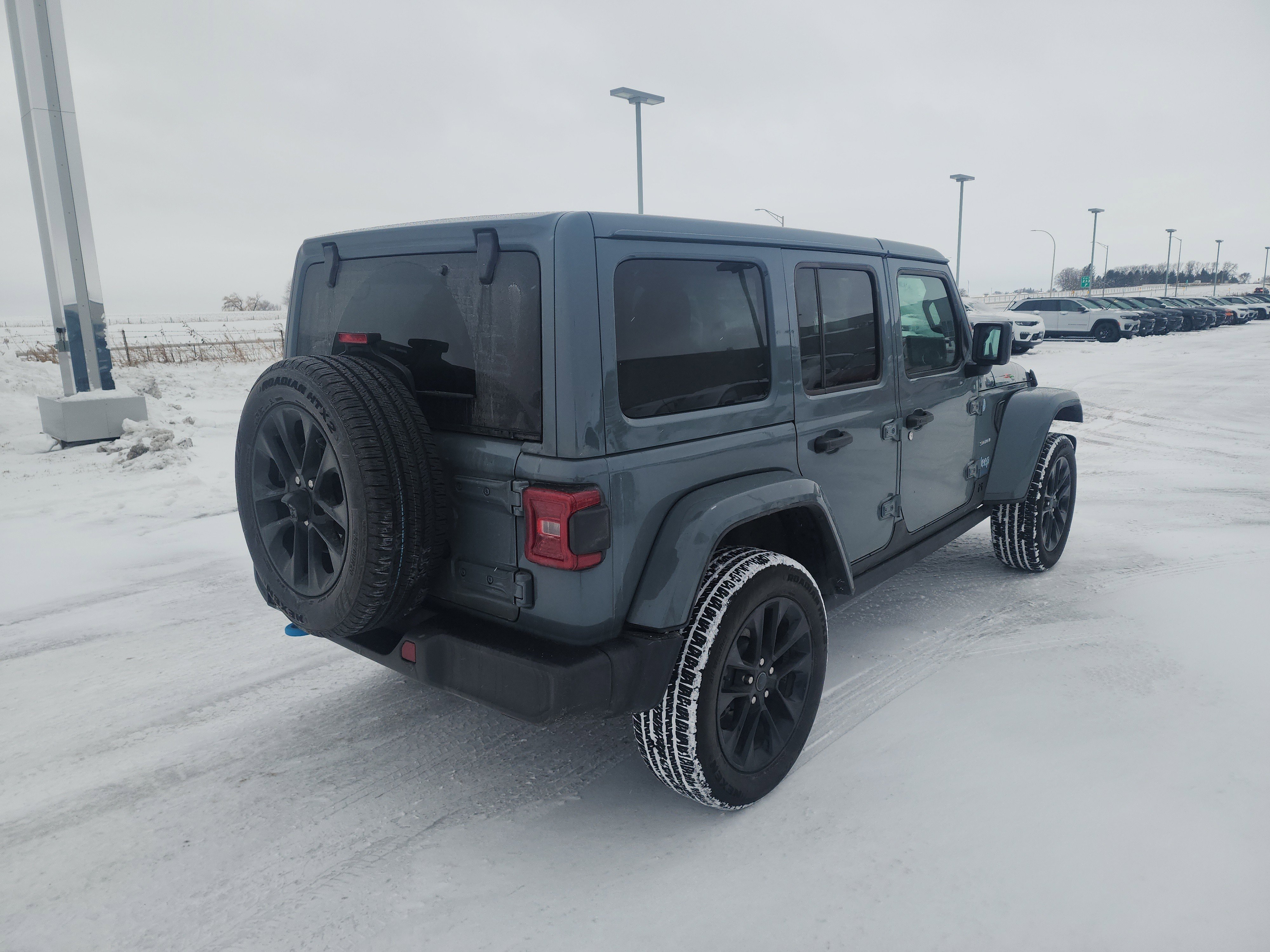 Used 2024 Jeep Wrangler 4xe Sahara 4XE with VIN 1C4RJXP65RW212975 for sale in Saint Charles, Minnesota