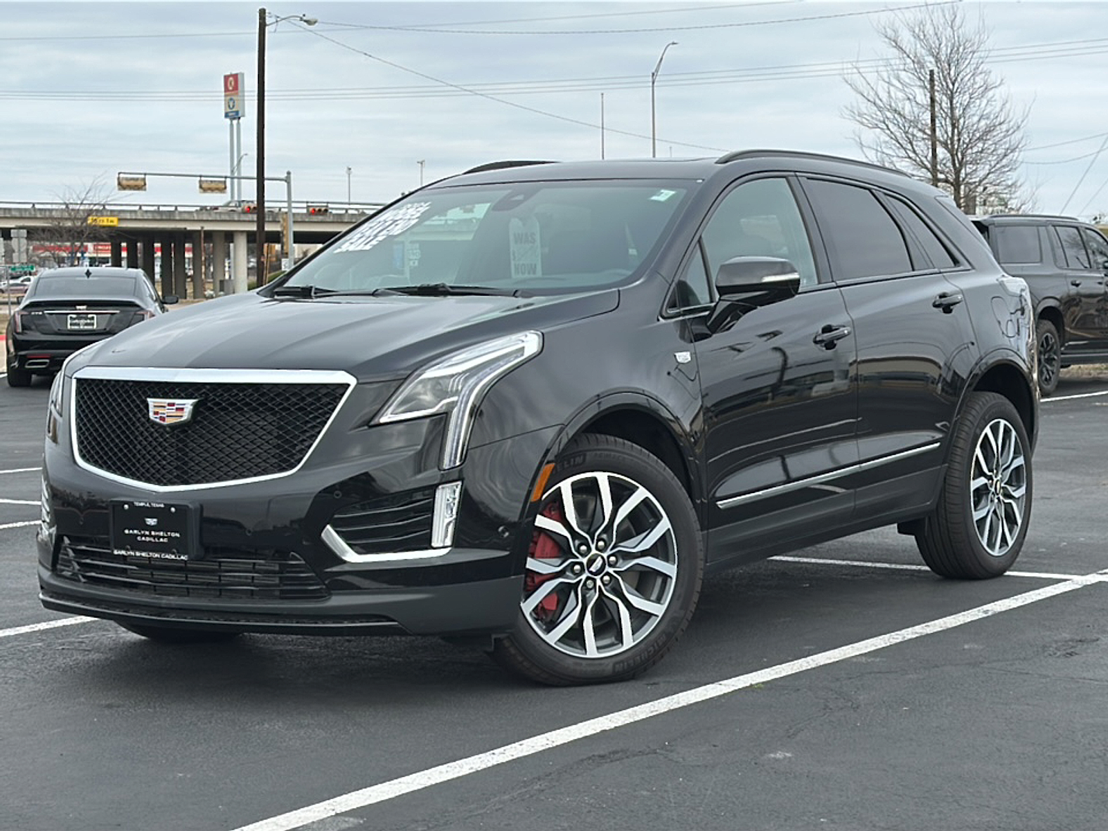 New 2024 Stellar Black Metallic Cadillac Sport image 1