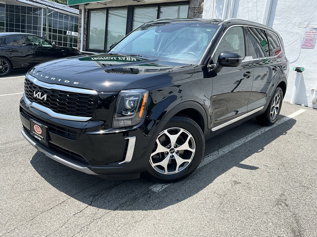 Used 2022 Black Kia EX image 1