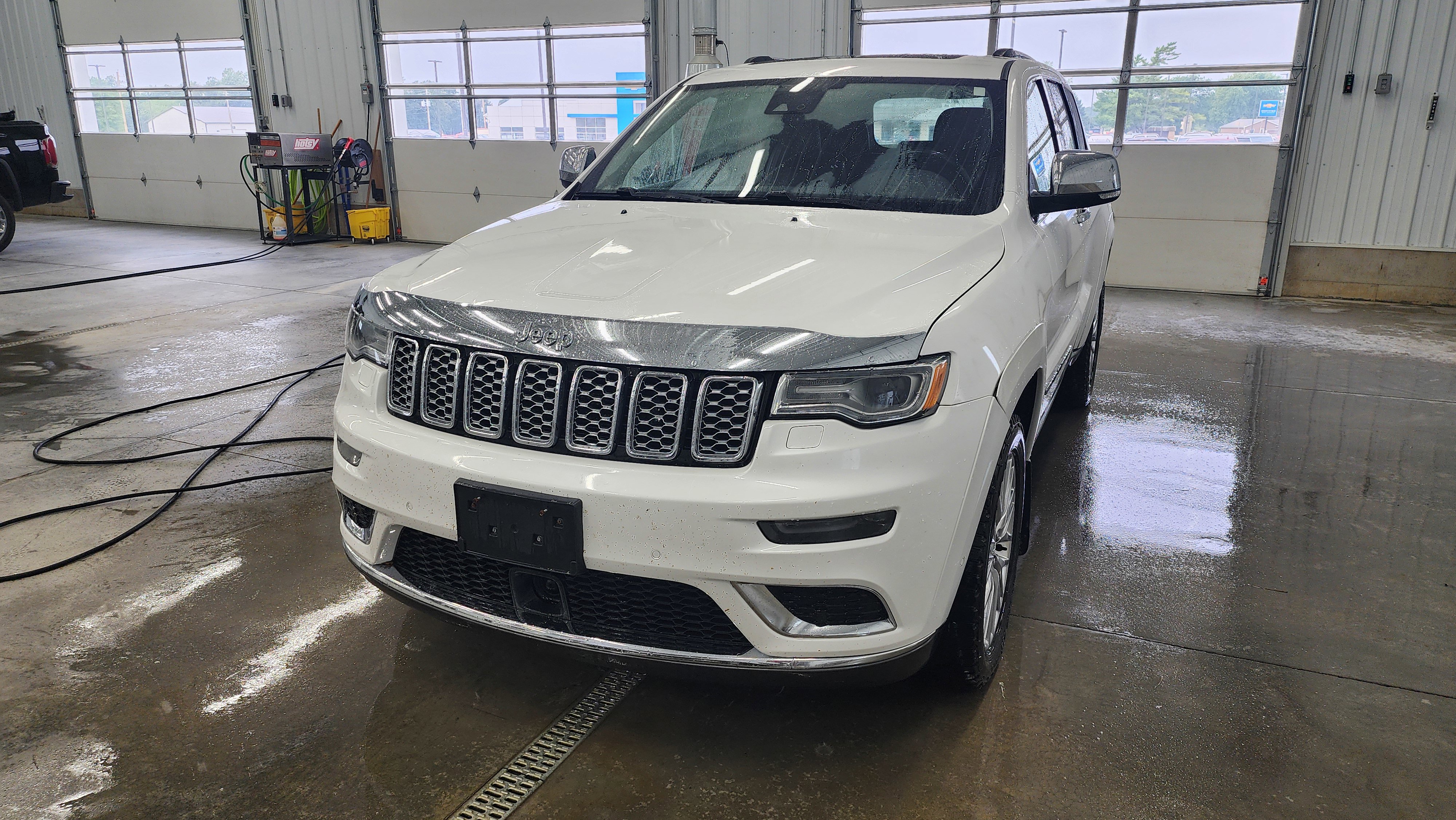 Used 2018 Jeep Grand Cherokee Summit with VIN 1C4RJFJG5JC199453 for sale in Lake City, IA