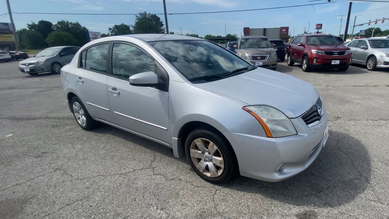 Used 2010 Silver Nissan SEDAN image 1