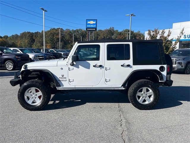 Used 2016 Jeep Wrangler Unlimited Sport S with VIN 1C4BJWDG3GL342017 for sale in Arden, NC