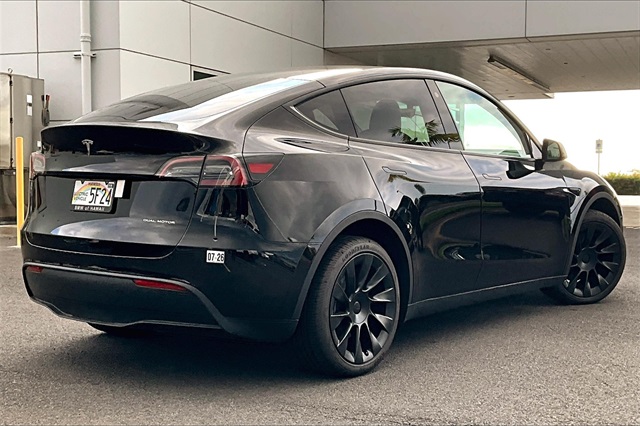 Used 2023 Tesla Model Y Long Range with VIN 7SAYGDEE7PF675207 for sale in Kansas City