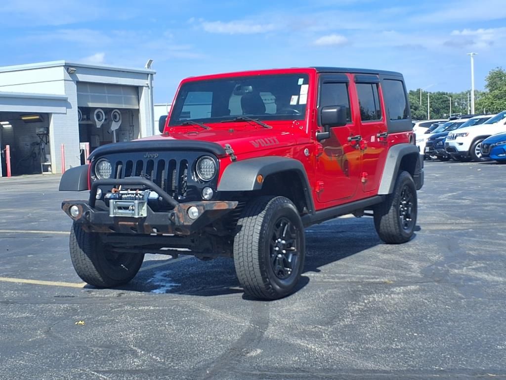 Used 2015 Jeep Wrangler Unlimited Sport with VIN 1C4BJWDG6FL626353 for sale in Kansas City