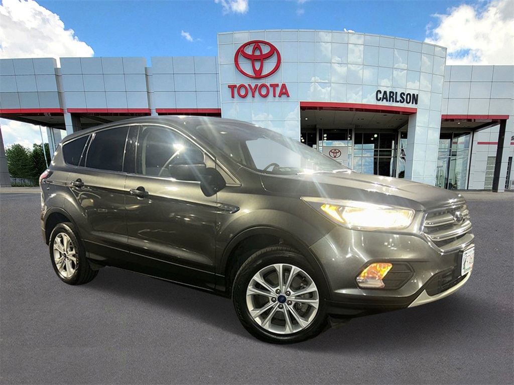 Used 2017 Ford Escape SE with VIN 1FMCU9GD4HUC32437 for sale in Minneapolis, Minnesota