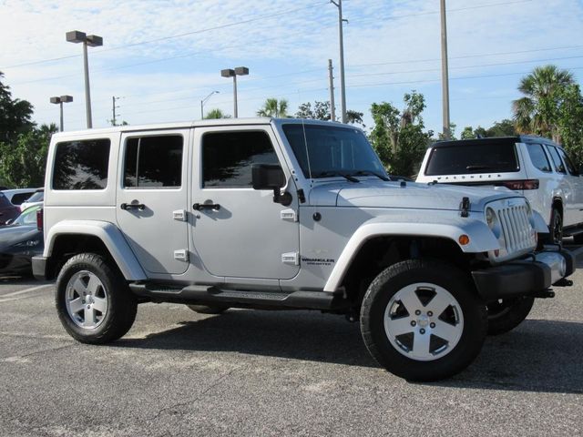 Used 2011 Jeep Wrangler Unlimited Sahara with VIN 1J4BA5H1XBL563763 for sale in Mount Dora, FL