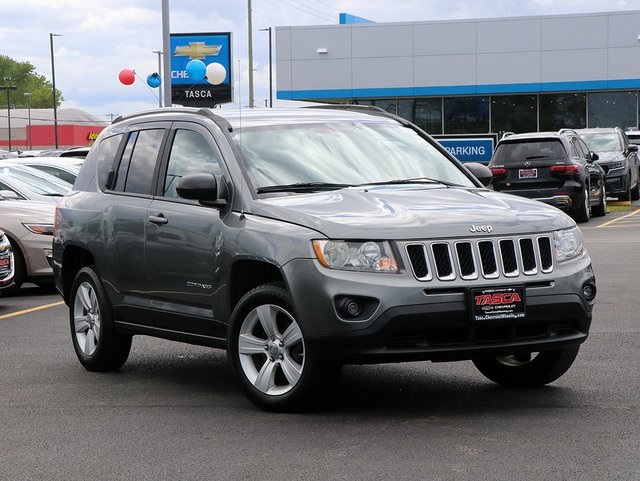 Used 2012 Gray Jeep Sport image 1