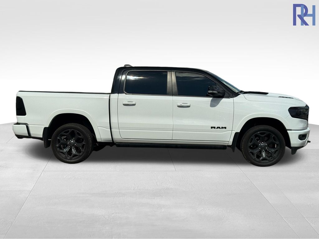 Used 2021 RAM Ram 1500 Limited with VIN 1C6SRFHM8MN672946 for sale in Coon Rapids, Minnesota