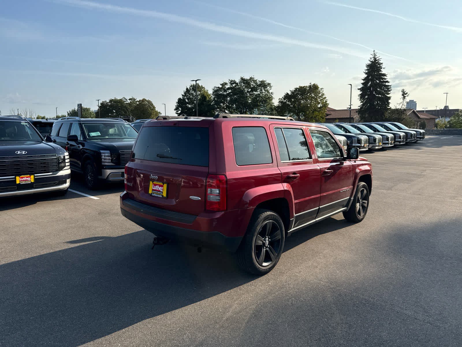Used 2014 Jeep Patriot Latitude with VIN 1C4NJRFBXED628034 for sale in Bloomington, Minnesota