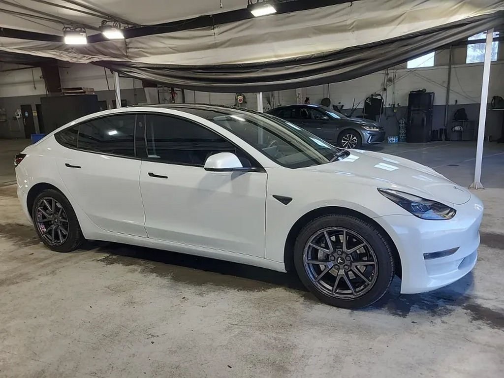 Used 2023 Tesla Model 3 Base with VIN 5YJ3E1EA8PF398057 for sale in Miami, FL