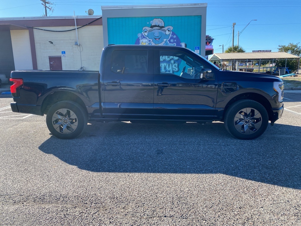 Used 2023 Ford F-150 Lightning Lariat with VIN 1FTVW1EV1PWG28610 for sale in Tampa, FL