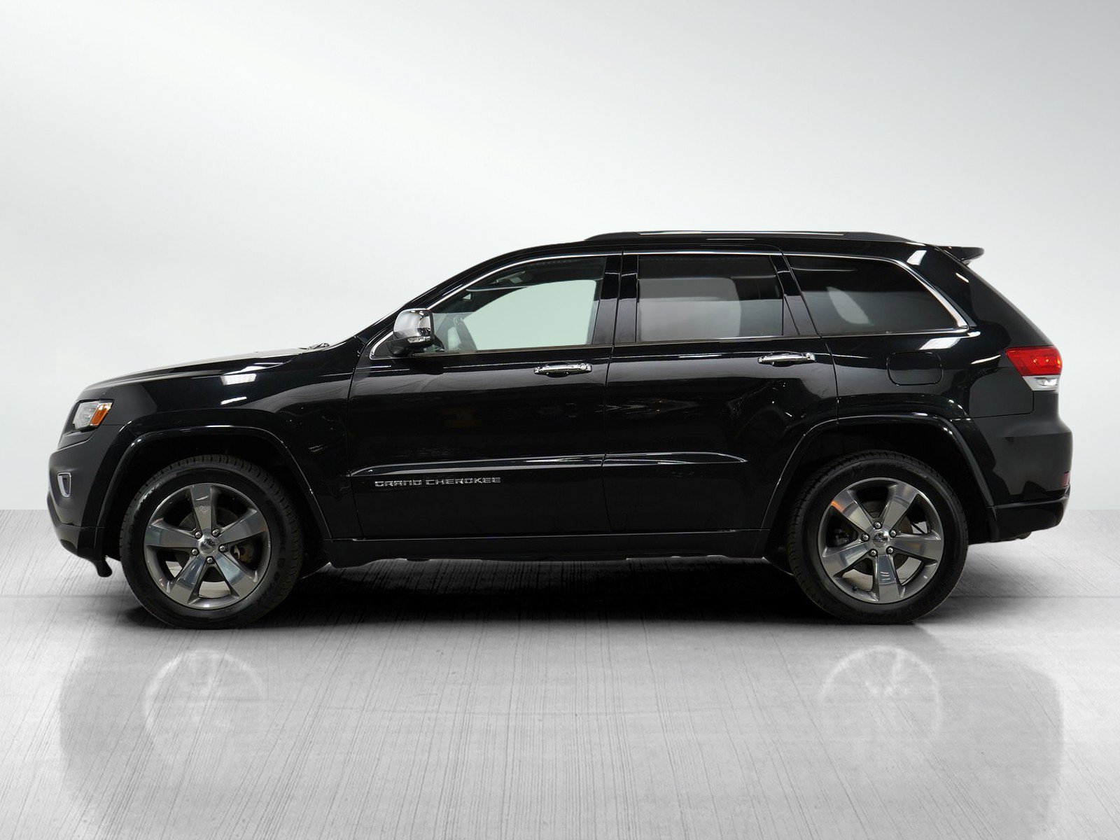 Used 2015 Jeep Grand Cherokee Overland with VIN 1C4RJFCG7FC871405 for sale in Burnsville, Minnesota