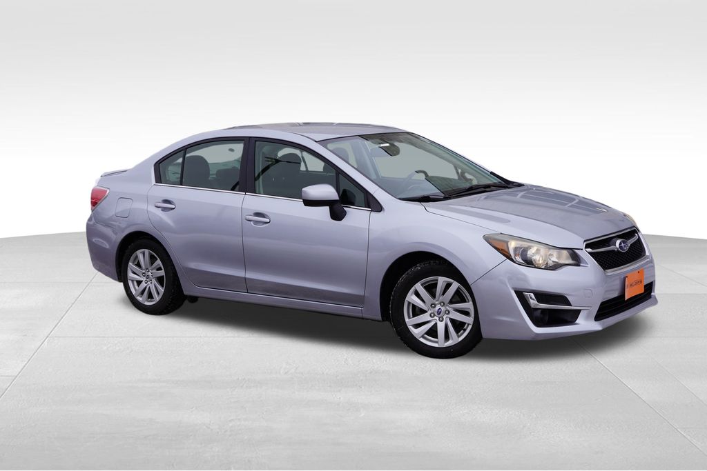 Used 2015 Subaru Impreza Premium with VIN JF1GJAC6XFH020581 for sale in Lakeville, MN
