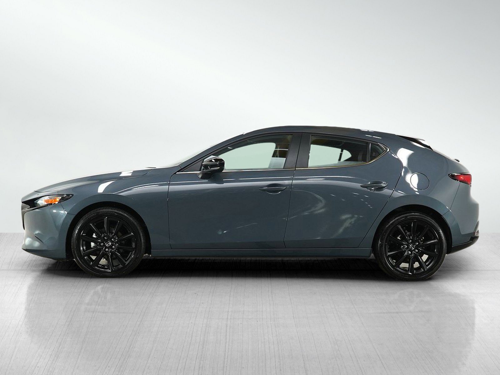 Used 2023 Mazda Mazda3 Carbon Edition with VIN JM1BPALM1P1607134 for sale in Burnsville, Minnesota